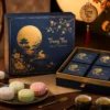 Hộp bánh trung thu dẻo quà tặng cao cấp trên bàn trang trí Trung Thu.